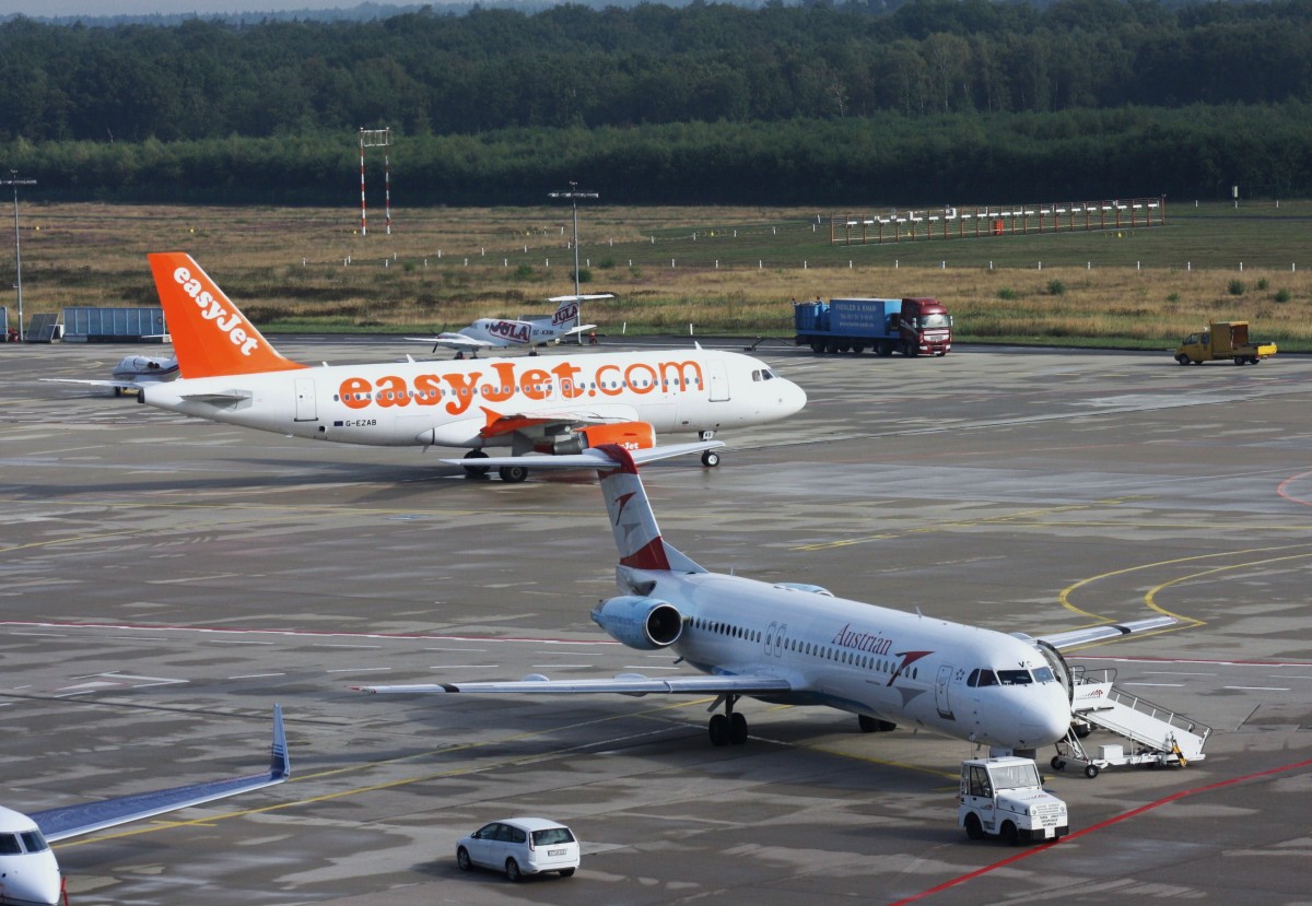 Austrian Arrows,OE-LVC,(c/n11446),Fokker F-100,09.09.2013,CGN-EDDK,Kln-Bonn,Germany(hinten:EasyJet,G-EZAB,A319-111)