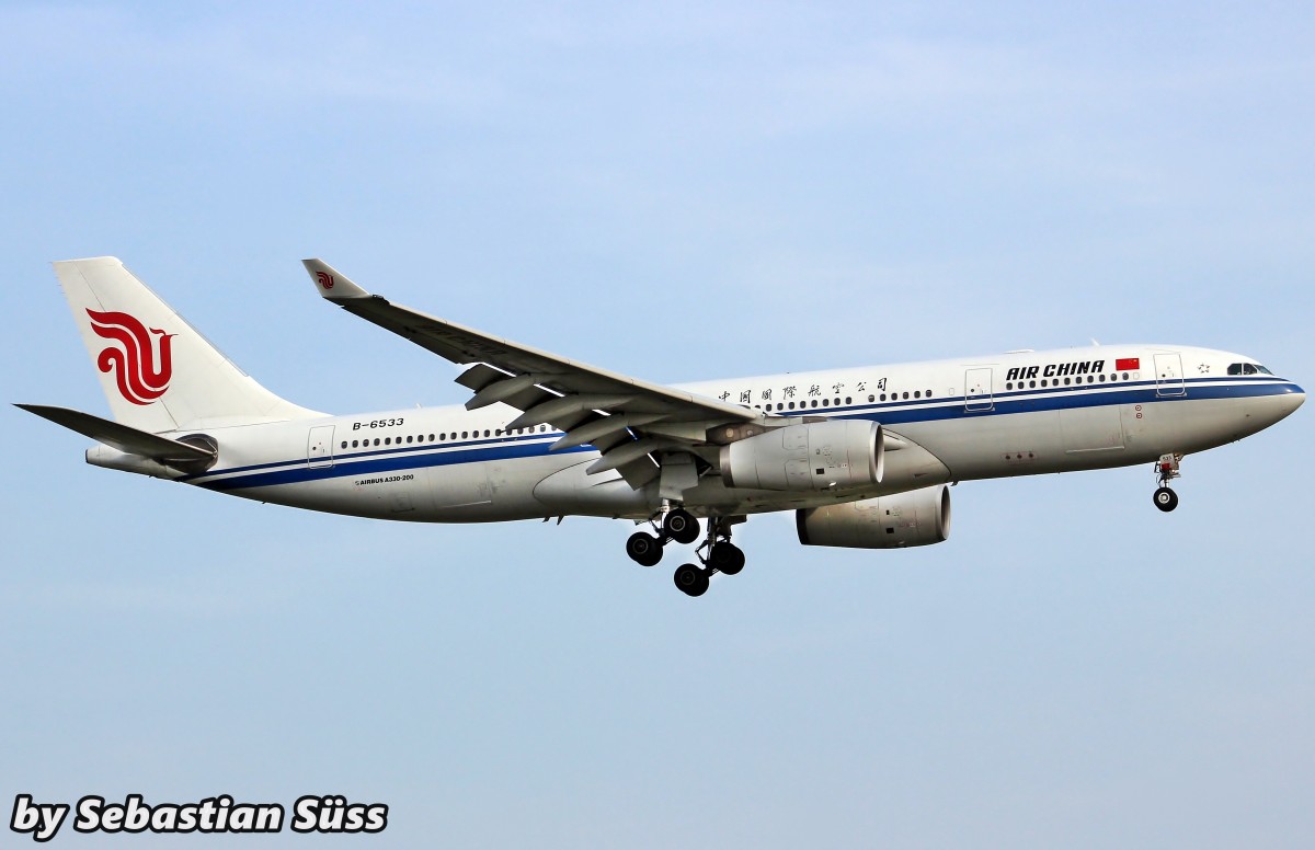 CA A330-200 B-6533 on short final rwy 23R. 21.4.15