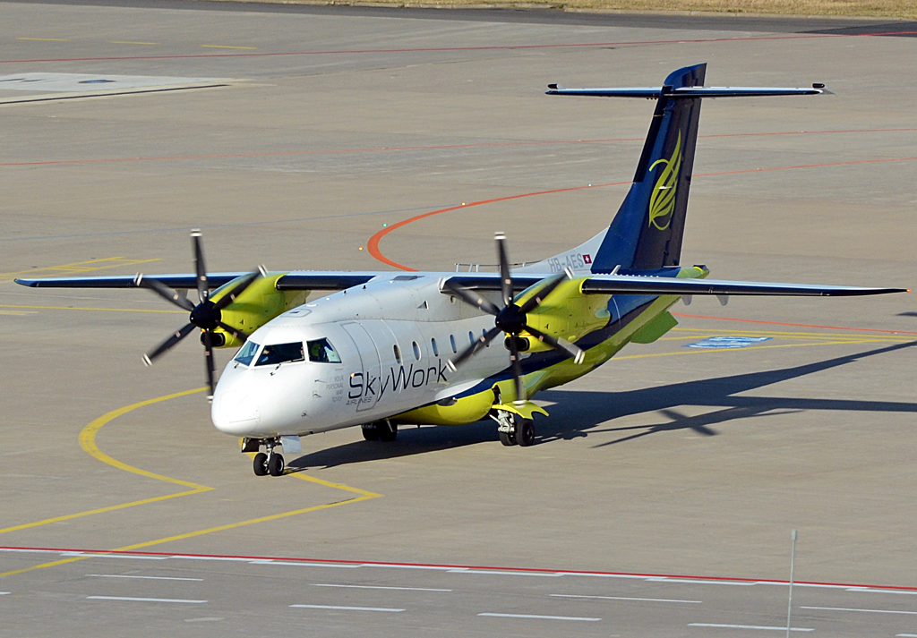 Do 328-110 HB-AES der Sky Work in Parkposition auf dem Flughafen Köln-Bonn - 10.04.2014