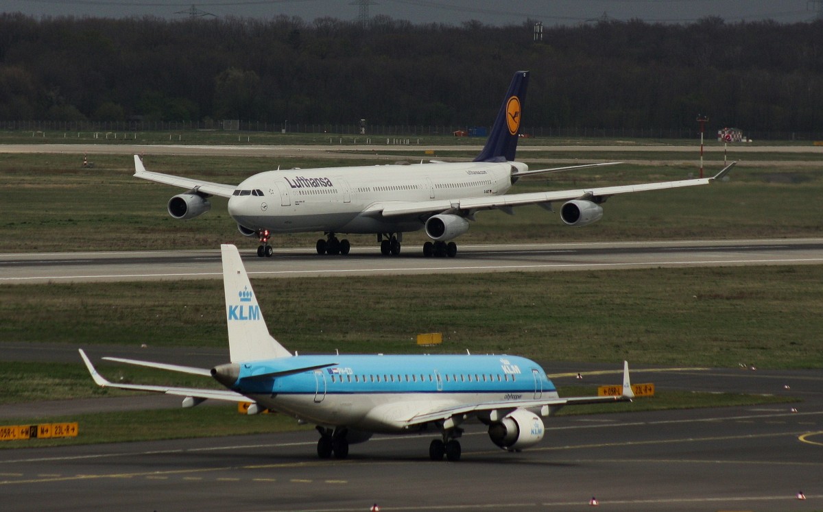 KLM Cityhopper,PH-EZI,(c/n 19000322),Embraer ERJ-190-100,11.04.2015,DUS-EDDL,Düsseldorf,Germany(oben:Lufthansa,D-AIGT,airbus A340-313)