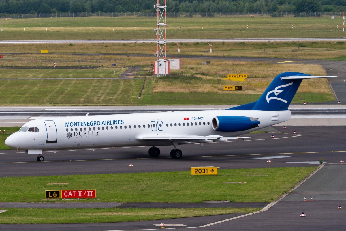 Montenegro Airlines (YM-MGX), 4O-AOP  Boka , Fokker, 100, 27.06.2015, DUS-EDDL, Düsseldorf, Germany