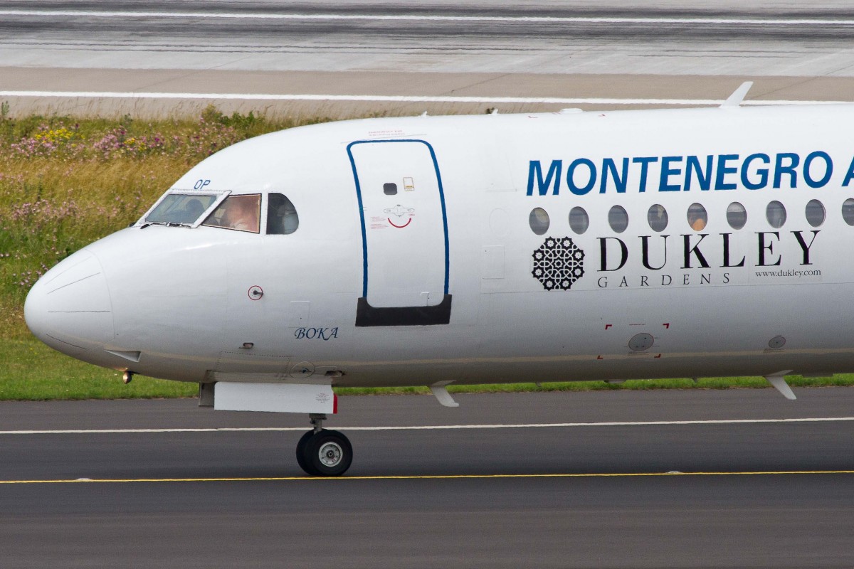 Montenegro Airlines (YM-MGX), 4O-AOP  Boka , Fokker, 100 (Bug/Nose), 27.06.2015, DUS-EDDL, Düsseldorf, Germany