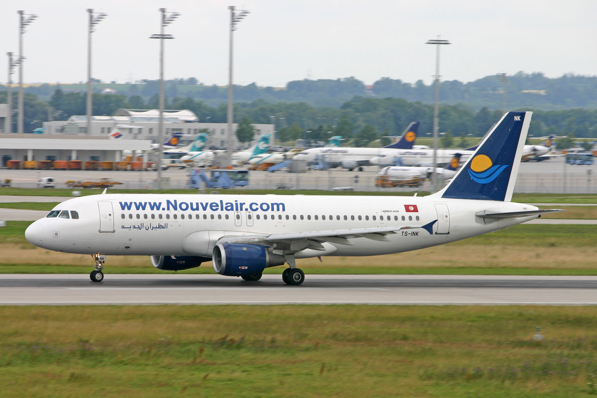 Nouveleair, TS-INK, Airbus A320-211, msn: 112, 11.Juli 2009, MUC München, Germany.