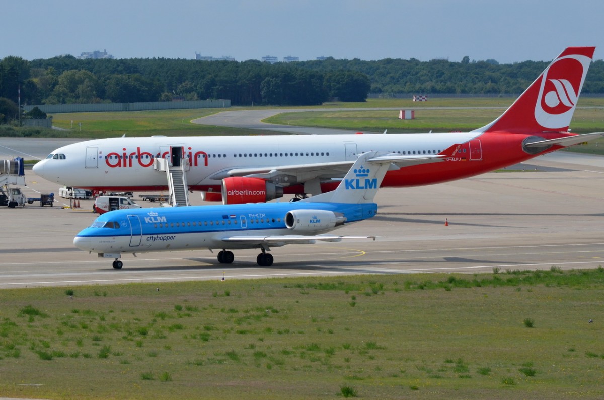 PH-KZM KLM Cityhopper Fokker  F70    zum Gate in Tegel am 21.08.2014