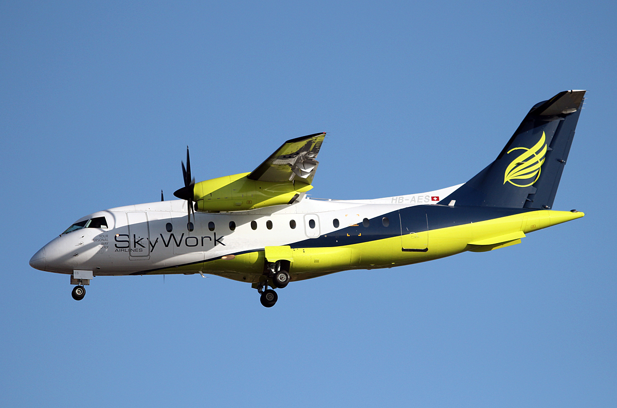 Sky Work Airlines Do-328-110 HB-AES bei der Landung in Berlin-Tegel am 08.03.2014