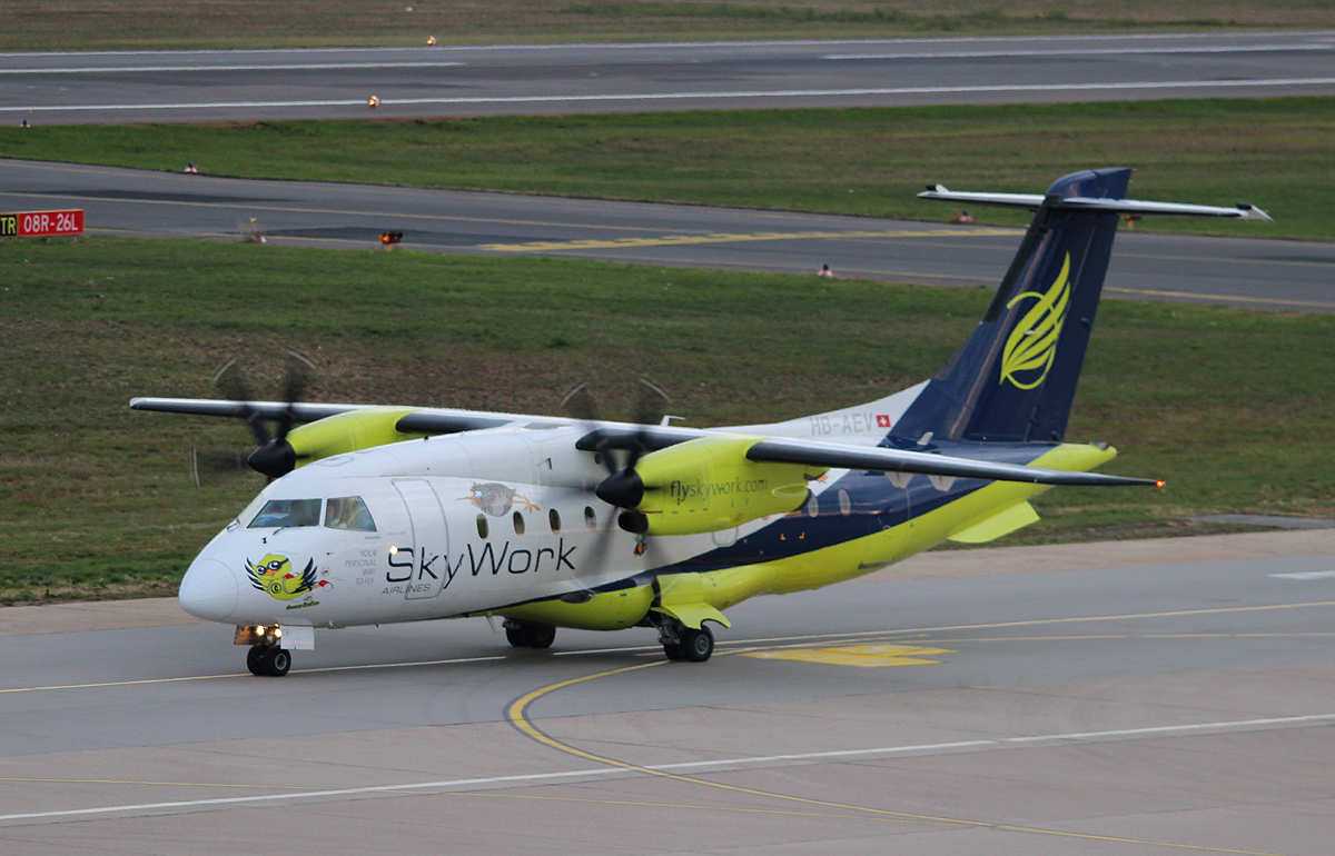 SkyWork Airlines Do-328-110 HB-AEV bei der Ankunft in Berlin-Tegel am 19.10.2013