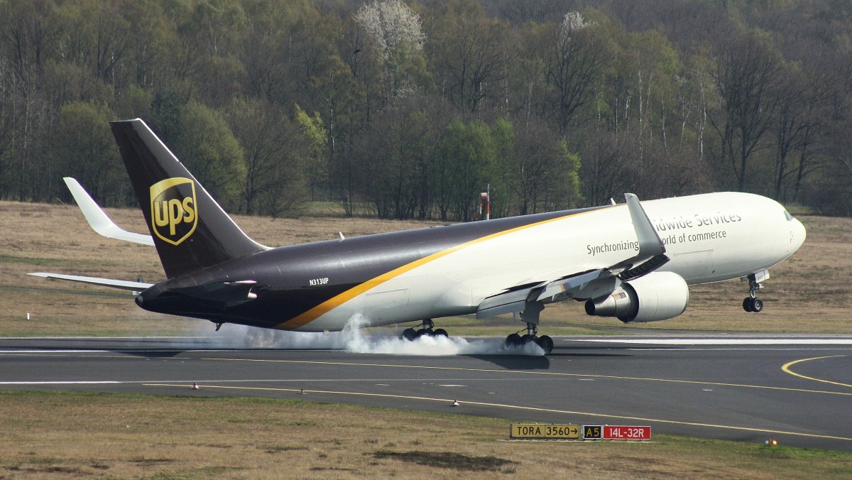 UPS United Parcel Service,N313UP,(c/n27764),Boeing 76734AF(ER),30.03.2014,CGNEDDK,KoelnBonn
