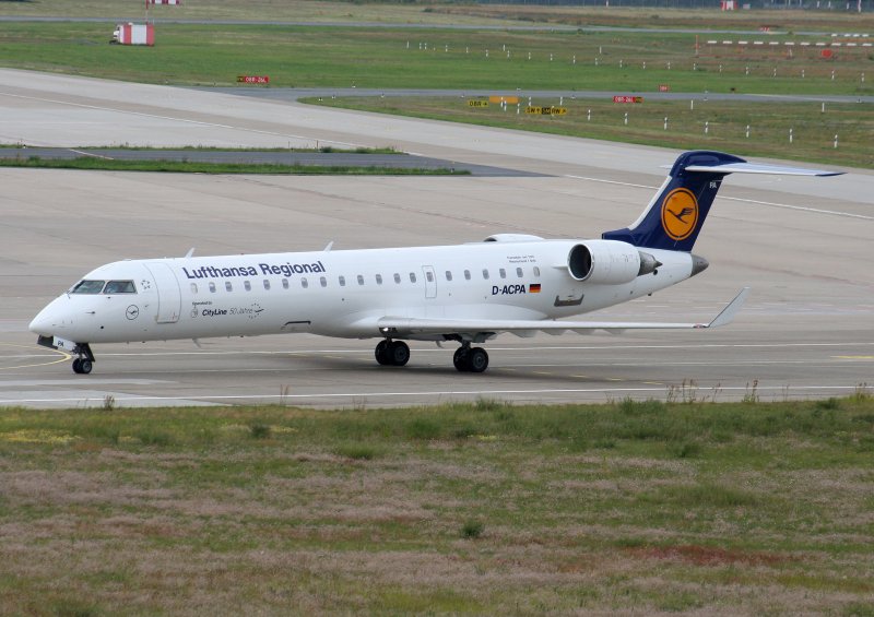 Lufthansa Regional(City Line) Canadair Regjet CRJ701ER 
D-ACPA  Westerland/Sylt am 26.07.2009  bei der Ankunft auf dem Flughafen Berlin-Tegel