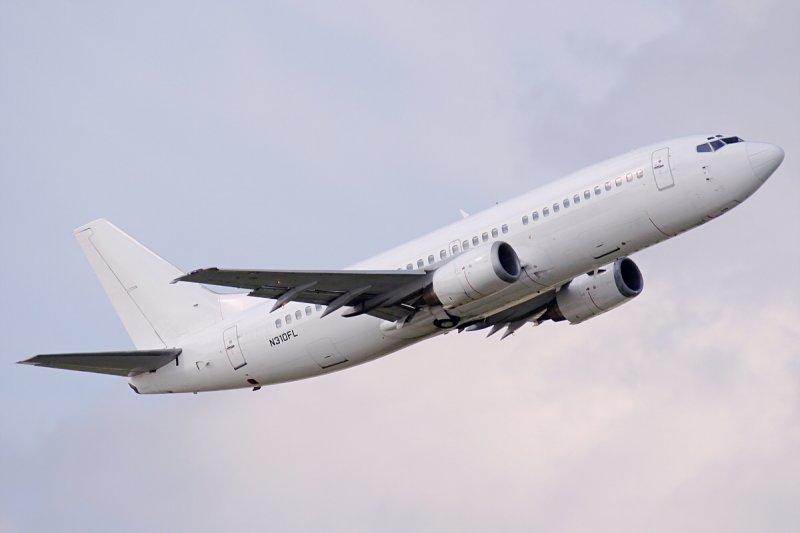 N310FL, B737-3L9, San Antonio IAP KSAT/SAT, 06.09.07, anonymous appear of these Boeing 737-300, which is taking off from SAT. The aircraft was first registered to Frontier Airlines. During the time this picture was taken it belonged to Wells Fargo Bank, who sold it to Garuda Indonesia Airlines (EOS350D Sigma 50-500)