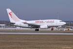 Tunisair, TS-IOL  Tozeur Nefta , B737-6H3 bei der Landung in MUC aus Enfidha (NBE) 16.03.2013