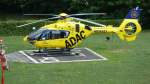 D-HBYH; (Airbus Helicopters EC135); Chistoph 31 der ADAC Luftrettung auf der Heimatbasis am CCBF (Charite Campus Benjamin Franklin) in Berlin-Steglitz. Der Grund für den Standplatz etwas abseits des Rollwagens vor dem Hangar war die Ankunft von D-HWVS, Christoph Brandenburg, der zum Tanken einschwebte. Die Tankanlage befindet sich im Bereich des Rollwagens vor dem Hangar. Foto:Im August 2015
