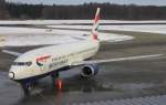 British Airways in Friedrichshafen, die Boeing 737-400 erreicht gerade die Gate-Position, aufgenommen in FDH am 27.01.2013