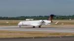 Eurowings Canadair CRJ-900 D-ACNK am Start in DUS (13.7.10)
