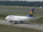 Boeing 737-300 der Lufthansa mit der Kennung D-ABEO und dem Taufnamen  Plauen  beim Taxiing in Berlin-Tegel