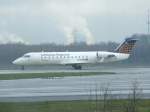 Ein Lufthansa Regional Canadiar Jet auf der Startbahn von Dsseldorf International Airport am 22.03.2008