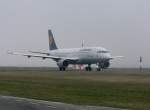Lufthansa A 320-211 D-AIPM  Troisdorf  auf dem Weg zum Start im morgenlichen Nebel des 25.03.2012