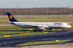 Lufthansa D-AIKM rollt zum Gate in Düsseldorf 21.11.2015