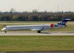 SAS, OY-KFI, Bombardier CRJ-900, 20.03.2011, DUS-EDDL, Dsseldorf, Germany    
