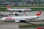 Swiss Airbus A330-343 HB-JHF und Boeing B777-3DE(ER) HB-JNF,
Zürich-Kloten Airport, 04.04.2017.