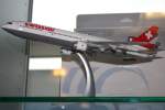 Modell einer Mc Donnell Douglas MD-11F der ehemaligen swissair in einer Vitrine am Flughafen Berlin-Schnefeld (17.08.10)