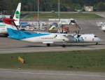 Luxair De Havilland Canada DHC-8-402Q LX-LGF auf dem Weg zum Start in Berlin-Tegel am 21.04.2011