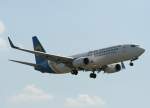 Ukraine International Airlines B 737-8HX UR-PSB kurz vor der Landung in Berlin-Tegel am 10.06.2011