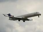 SAS Canadair Regjet CRJ900 OY-KFB kurz vor der Landung in Berlin-Tegel am 18.06.2011