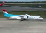 Luxair De Havilland Canada DHC-8-402Q LX-LGD auf dem Weg zum Start in Berlin-Tegel am 25.06.2011