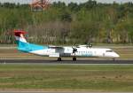 Luxair De Havilland Canada DHC-8-402Q LX-LGF nach der Landung in Berlin-Tegel am 28.04.2012