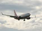 Air Berlin B 737-7K5 D-AHXD kurz vor der Landung in Berlin-Tegel am 09.06.2012
