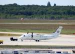 Eine Dornier Do-328-100 D-CCIR der CIRRUS Airlines, abgestellt vor dem Hangar des Flughafen Berlin Tegel, 09.05.09.