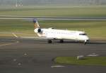 Lufthansa Regional(Eurowings) Canadair Regjet CRJ900NG D-ACNP auf dem Weg zum Start in Dsseldorf am 31.10.2011
