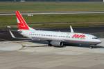 Lauda B737-800 OE-LNQ rollt zur 23L in DUS / EDDL / Dsseldorf am 12.10.2008