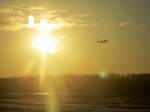 Sonnenaufgang aus dem Flugzeug nach unserer Landung auf dem Flughafen Frankfurt/ Main. 16.03.2013