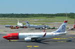 Norwegian Air Boeing 737-800 LN-DYZ das Heck der Maschine ziert Aril Snorre Edvardsen (* 15.