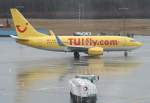 Tuifly B 737-7K5 D-AHXE am 10.03.2009 auf dem Flughafen Kln-Bonn im strmenden Regen