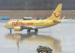Tuifly B 737-7K5 D-AHXG am 10.03.2009 im strmenden Regen auf dem Flughafen Kln-Bonn