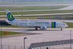 Transavia, PH-HSG, Boeing 737-8K2(W) rollt nach der Landung aus London-Gatwick (LGW) in MUC zum Terminal 1.  19.05.2012