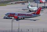 Jet2.com, G-CELU  Jet2 Majorca , Boeing 737-377 wird in MUC zur Abstellposition bei 08L geschleppt.  19.05.2012