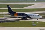 Titan Airways, G-POWC, Boeing B 737-33A(QC) rollt nach der Landung aus London-Stansted (STN) in MUC zum Terminal 1.  19.05.2012
