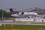 Augsburg Airways, D-ADHR, DHC 8-402Q in MUC im Landeanflug aus Basel (BSL) 15.05.2013