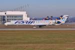S5-AAO / Adria Airways / CRJ 900LR in MUC bei der Landung aus Pristina (PRN) 16.12.2013