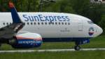INN Innsbruck-Kranebitten, Austria -  1.Mai 2011 -  SunExpress Boeing 737-8HC  -    TC-SNT - taxiing on Rwy 08 to AYT (Antalya)    