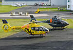 EC 135P-2 D-HHIT ADAC und H 135 D-HABR vor der ADAC-Werft und der R 22 D-HALW AirLloyd an der Tankstelle in EDKB - 10.01.2023