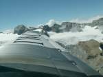 Ju-Air,Hier sieht man mal über die Tragfläche auf die Schweizer Alpenwelt.25.07.07