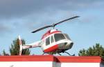 Ausgeschlachtete Bell 206 als Werbetrger auf dem Dach einer Sicherheitsfirma in Meckenheim - 04.12.2009