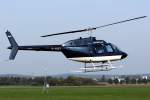 Bell 206B-3 Jet Ranger III, D-HJET Fa. Rotorflug, hovert zur Tankstelle in EDKB - 12.10.2015