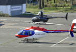 Bell 206 JetRanger III D-HIPY und R 44 D-HCCH vor der Air Lloydhalle in Bonn-Hangelar - 29.03.2019