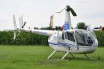 Robinson R-44 Raven II, D-HNEL, auf einer Wiese in Eu-Kirchheim 14.08.2010