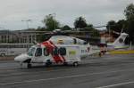 Am 26.05.2010 ein Helicopter EC-KJT  einer Hilfsorganisation auf dem Hafengelände in Santander/Spanien.